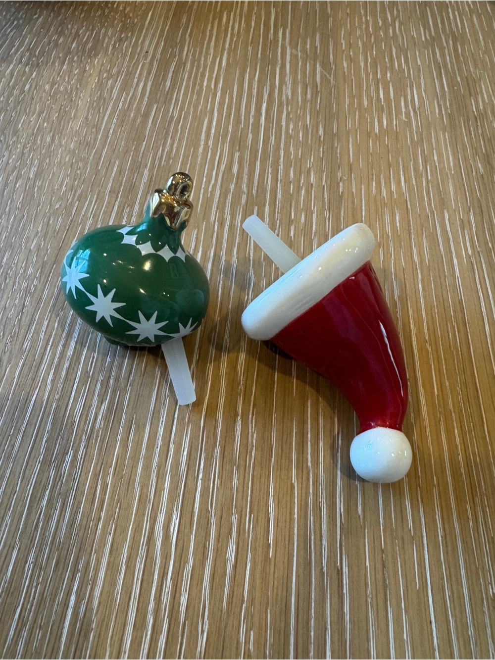 Nora Fleming Red Santa Hat & Green Star Spinning Tree Toppers